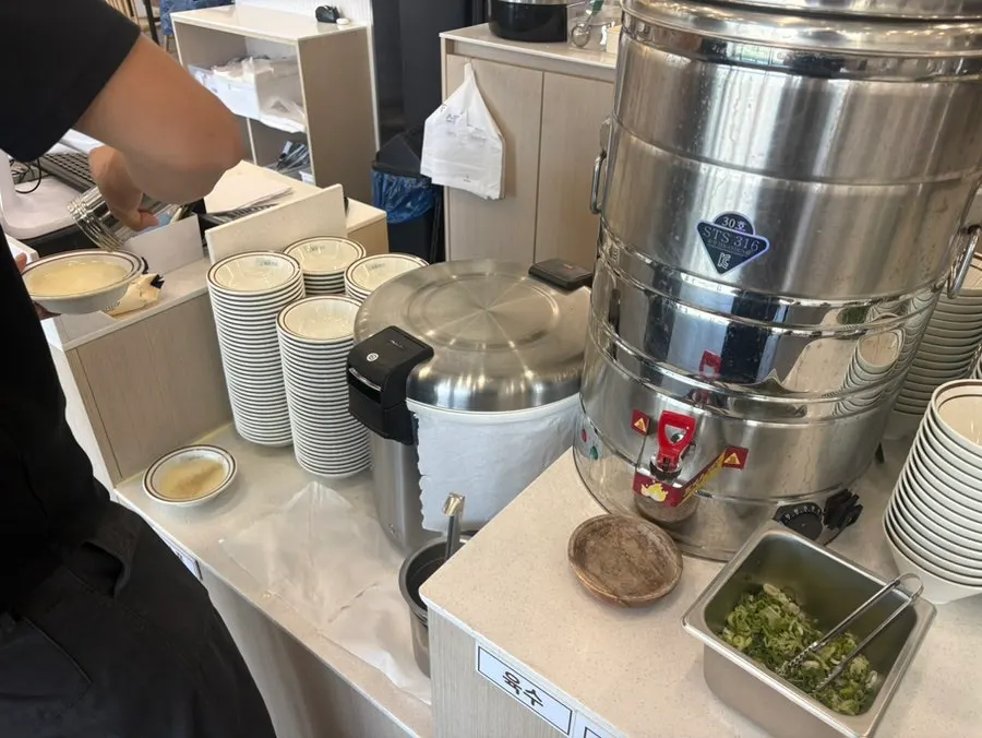 Self-serve donkatsu sauce, soup, and broth station