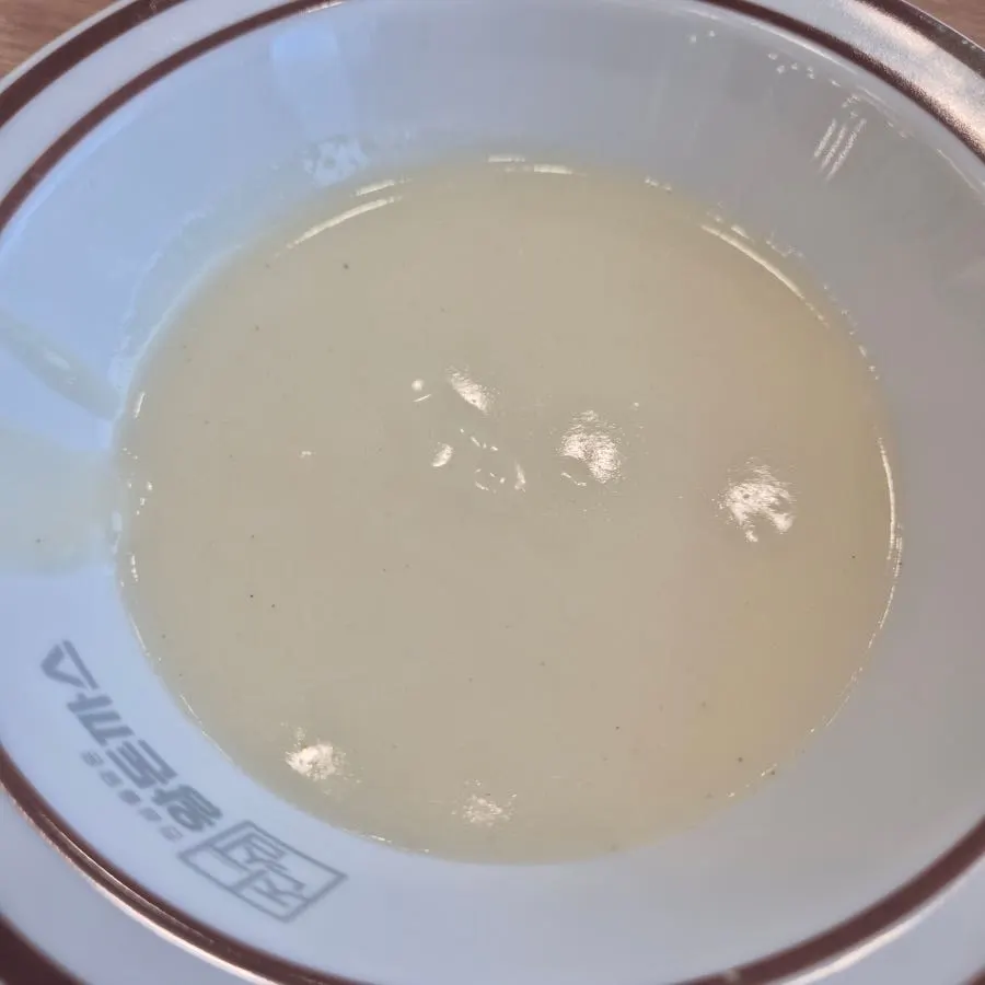 Warm soup scooped from the self-serve bar