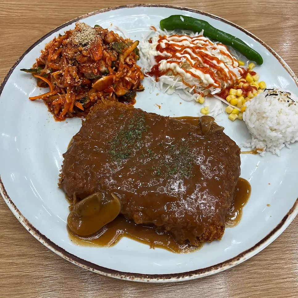 Table setting with a plate of Jinsim Jjol Cheese Katsu