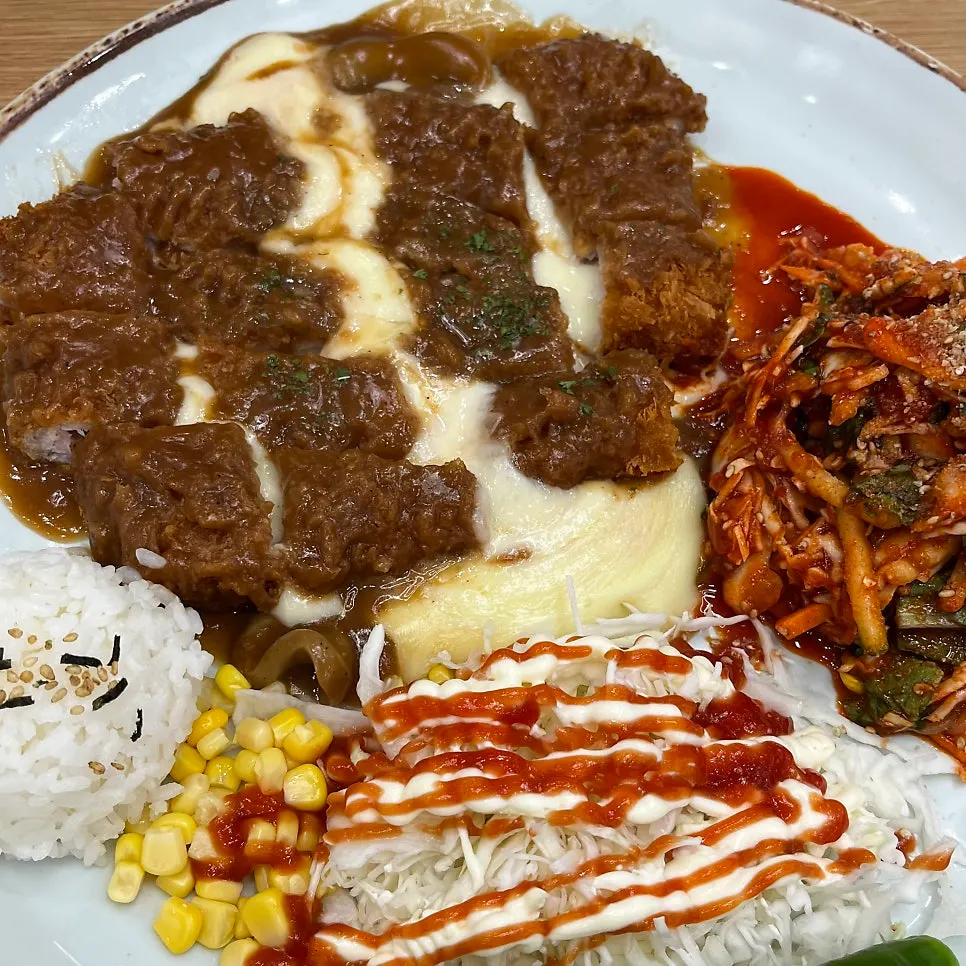 Cross-section of cheese tonkatsu with cheese pouring out