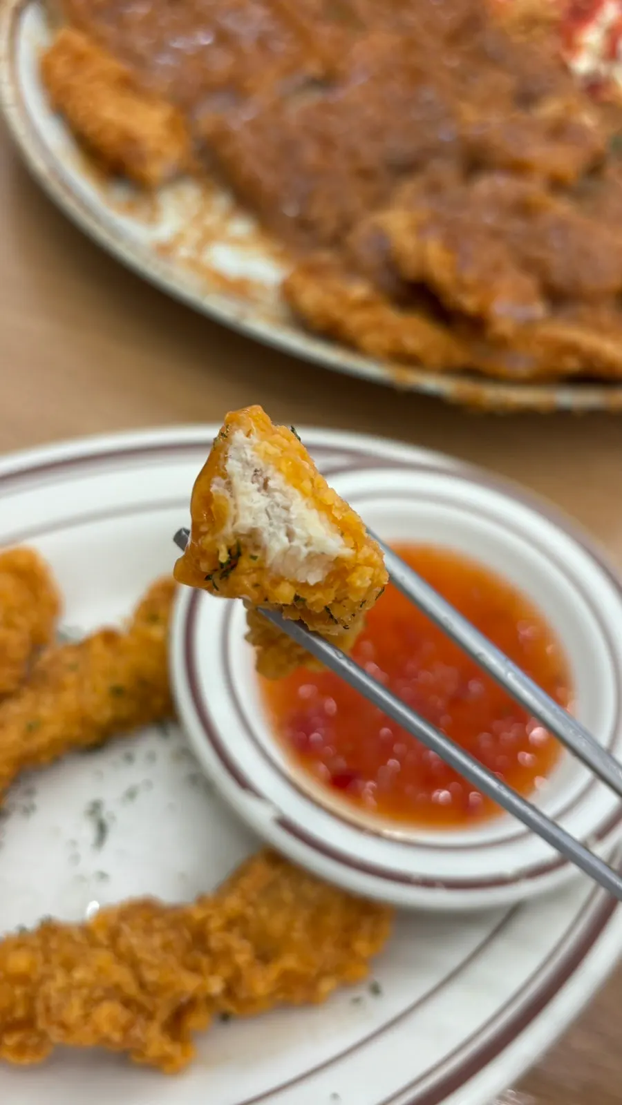 Chicken tender mojado en salsa de chile