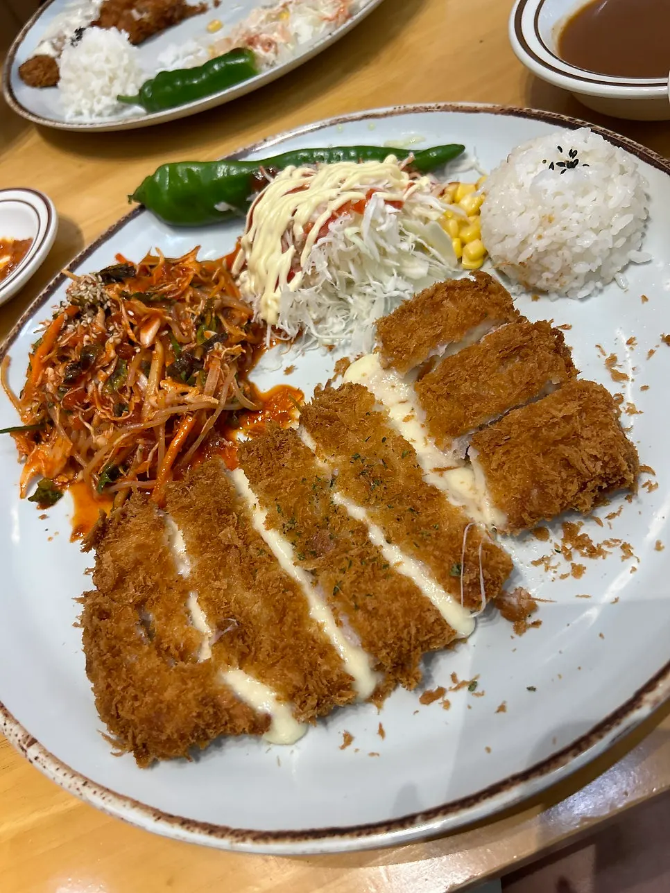 A full spread of cheese cutlet and jjolmyeon