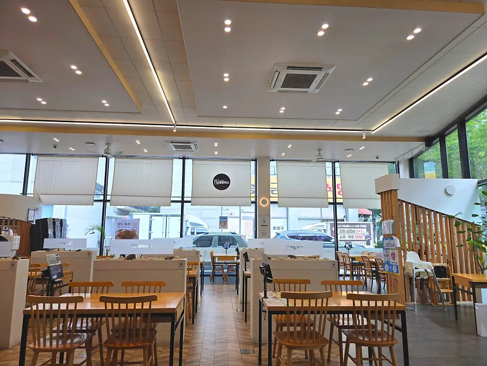 Interior of Jinsim Wang Donkkaseu Cheomdan with many tables