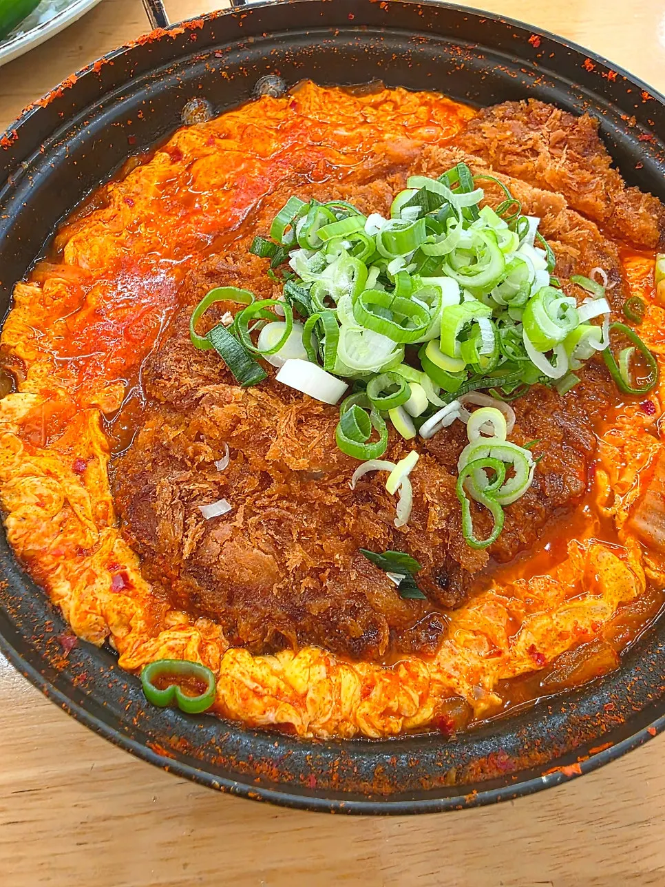 Cutlet submerged in kimchi nabe broth