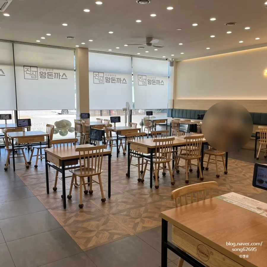 Spacious dining hall seating at Jinsim King Donkatsu Pyeongdong Branch