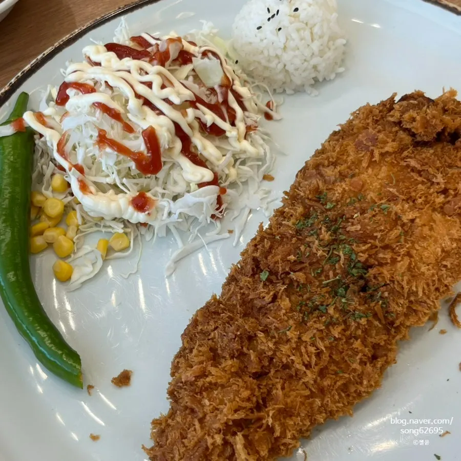 A table with Jinsim Jjol Cheese Cutlet and Jinsim Fish Cutlet