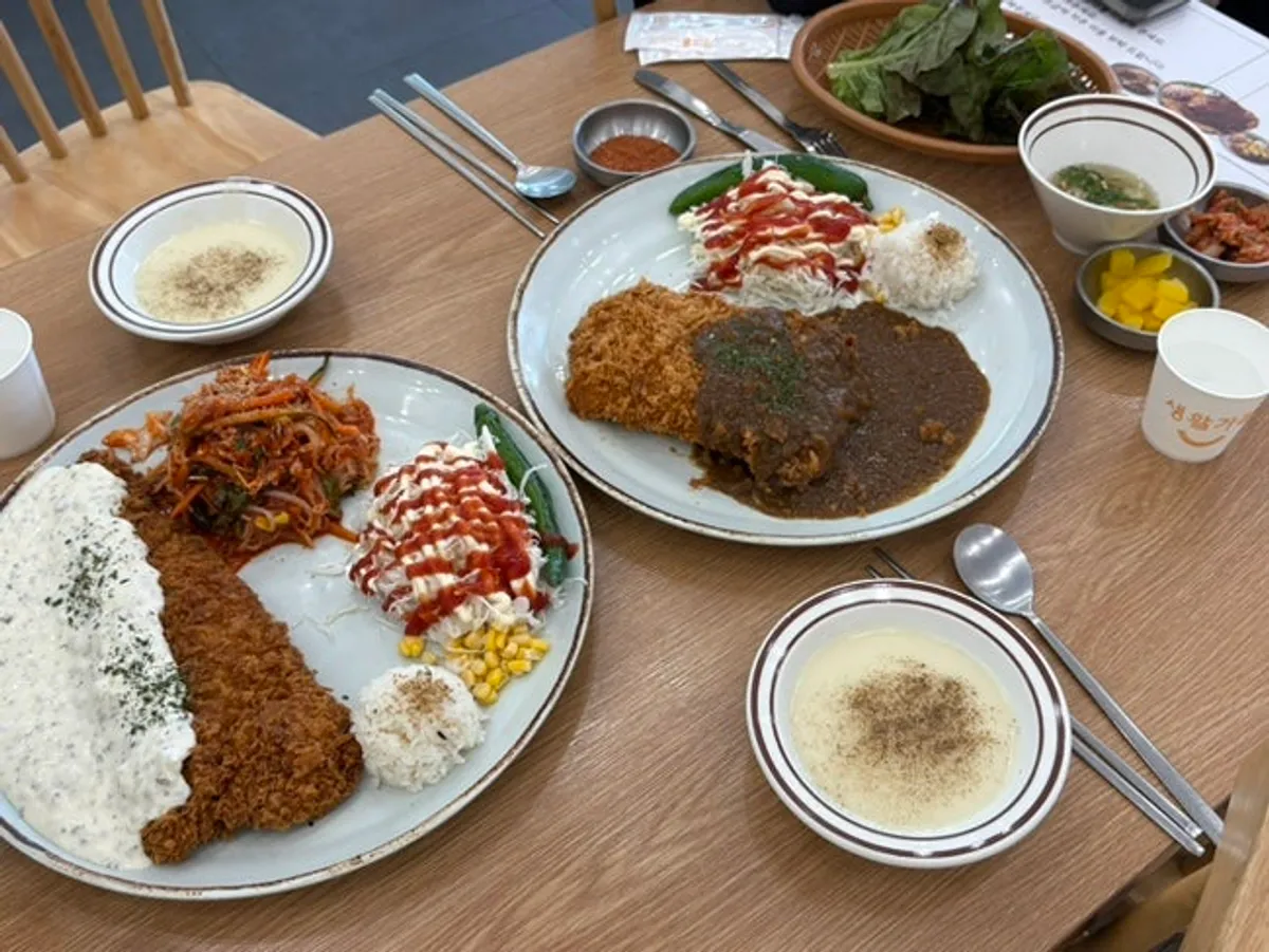 Full spread of Jinsim Jjol Fish Katsu and Cheese Waterfall Curry Katsu