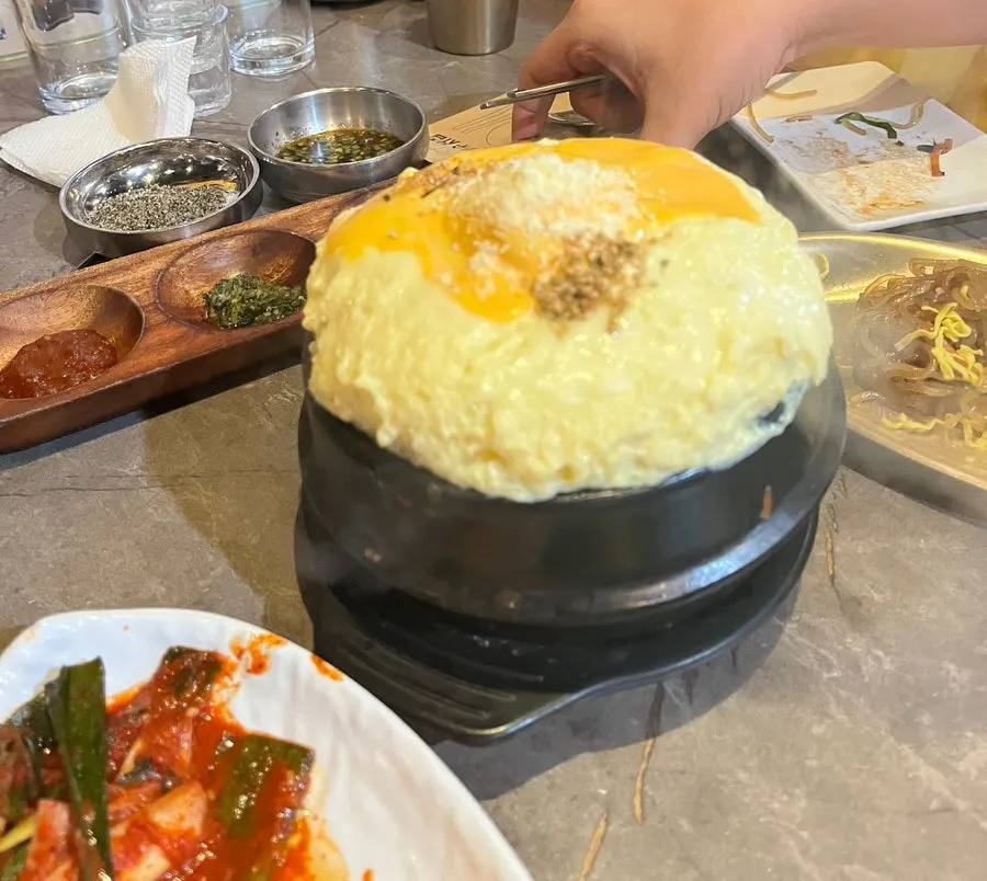 A piece of meat infused with straw-fire aroma