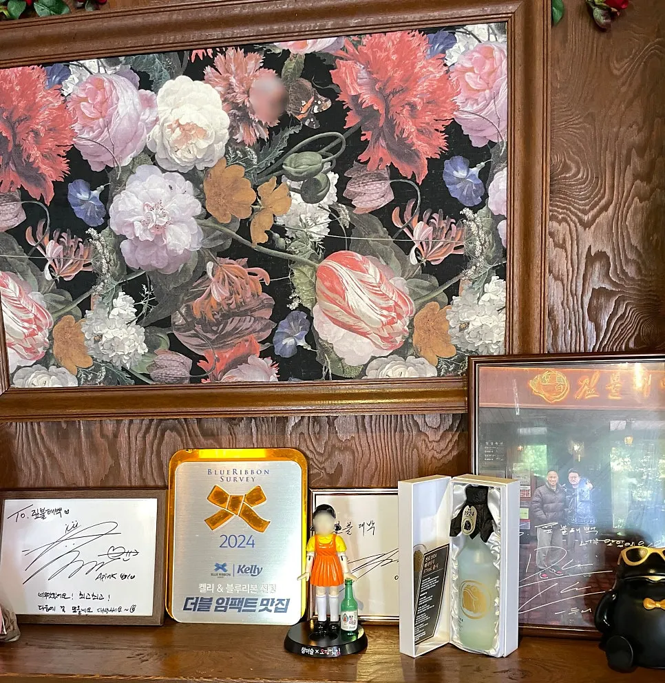 Celebrity autographs and photos on the wall