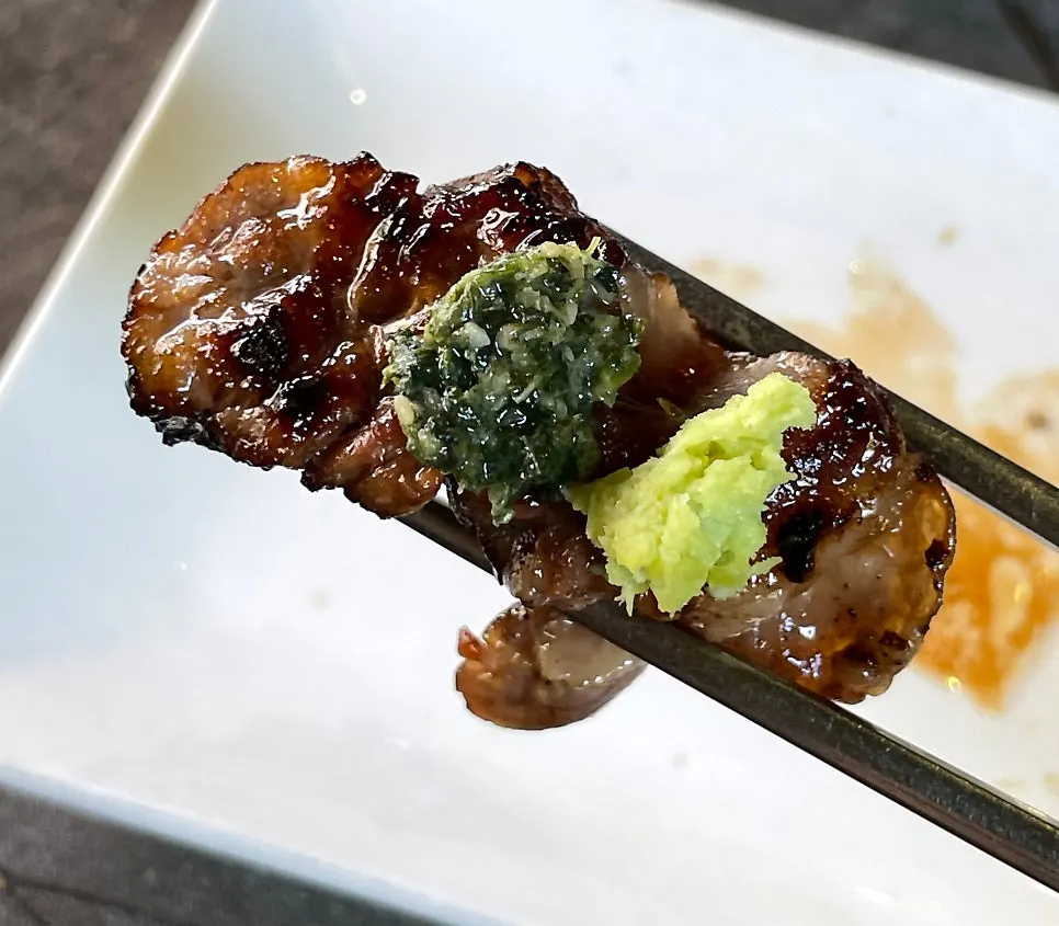 Woo-dae galbi dipped in sauce