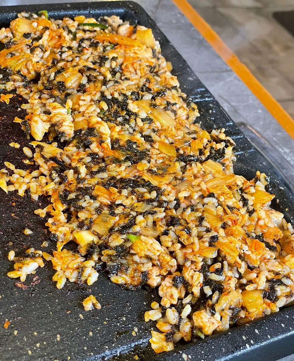 Fried rice being cooked on the grill