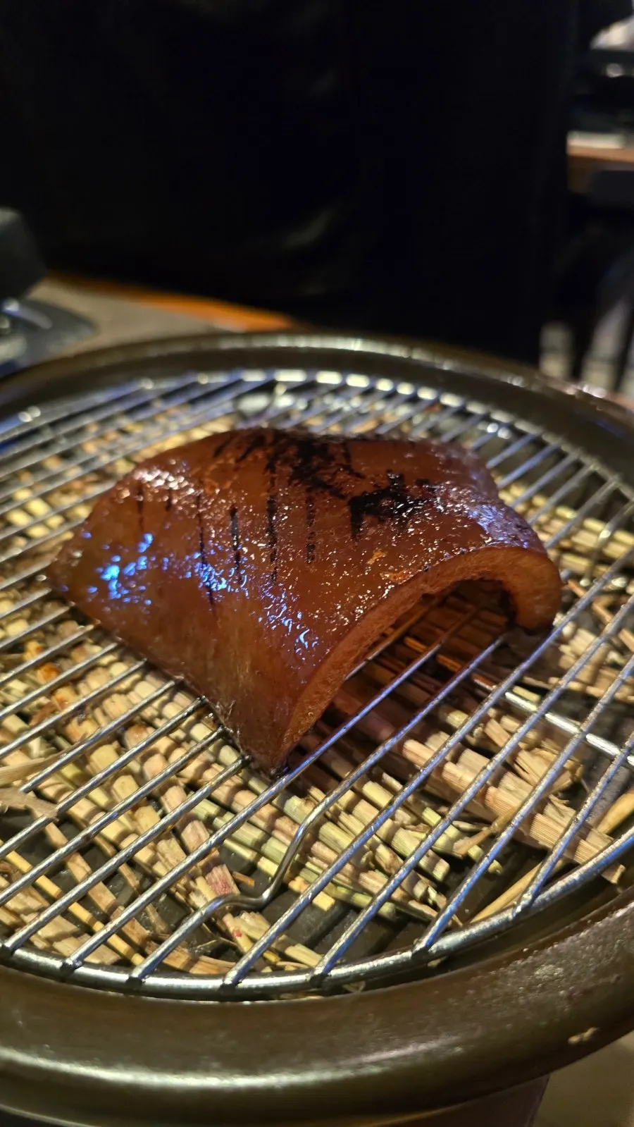 Pork skin and soju on the table