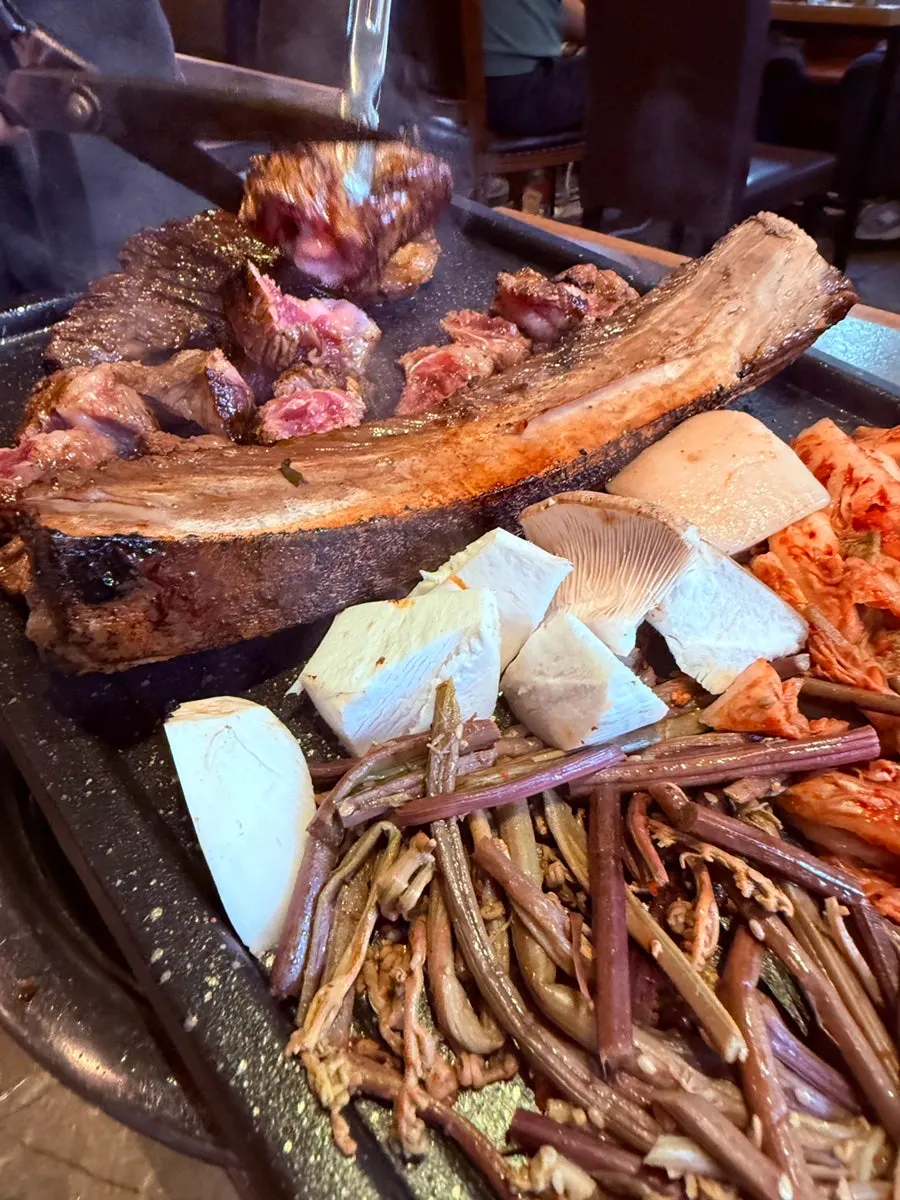 A piece of grilled marinated taebaek straw-fire beef