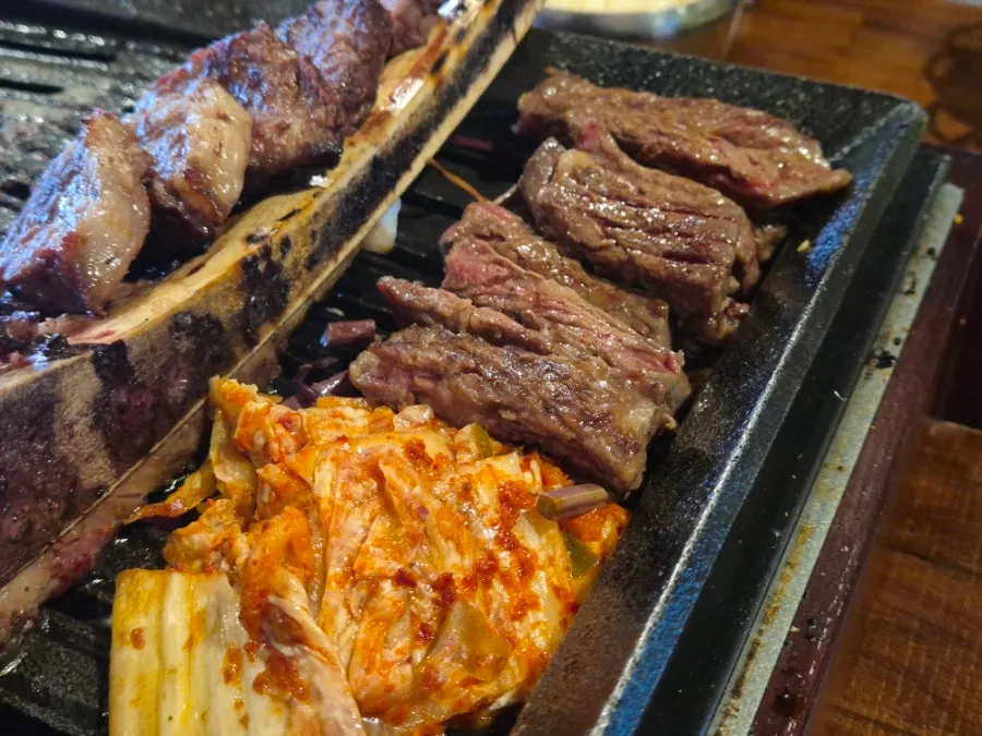 Final crispy-grilled bits of meat trimmed from the bone