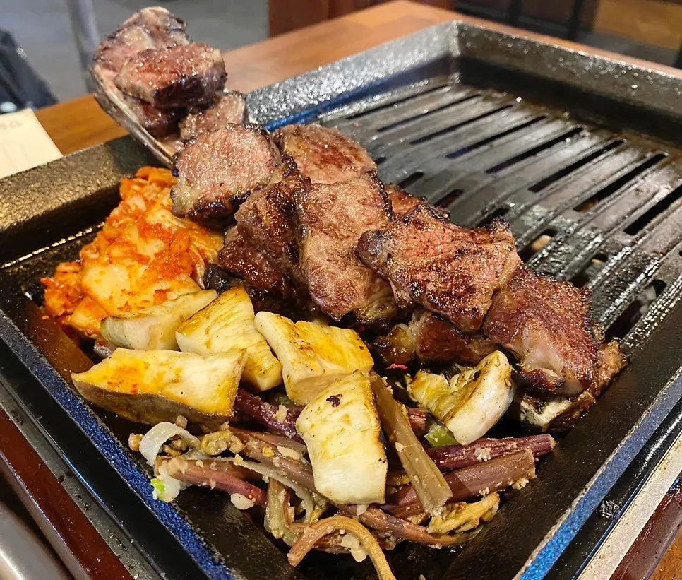 Prime rib trimmed and cut into bite-sized pieces by staff