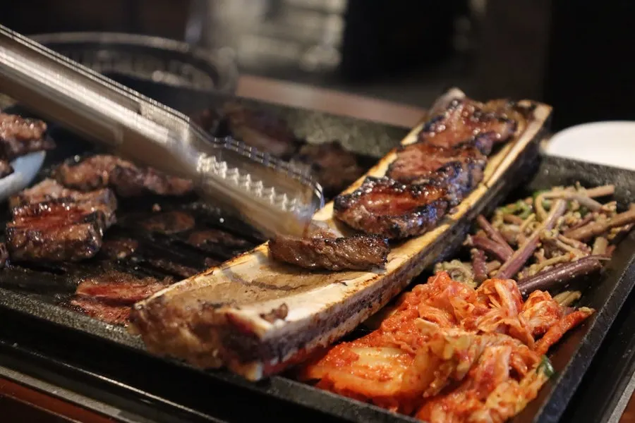 Prime ribs served together with side dishes
