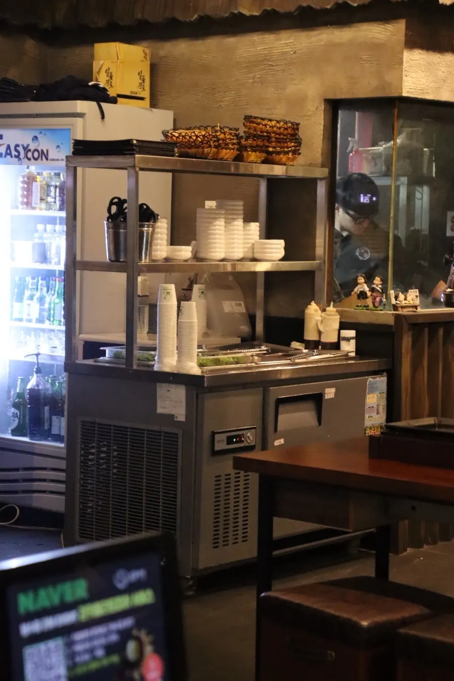Self-serve bar where guests can take wraps and sauces