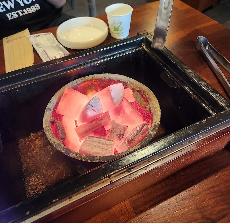 Rice-straw smoking in the open kitchen