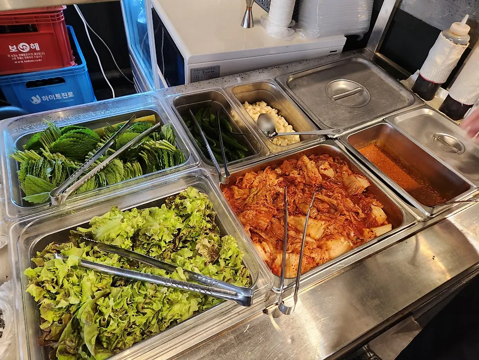 Self-serve bar side dishes with garlic and perilla leaves