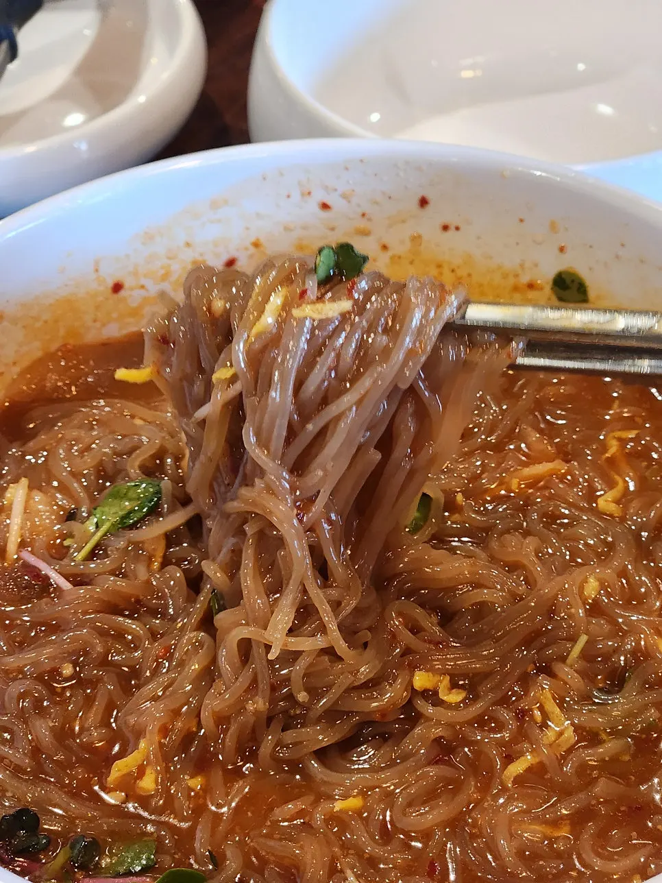 Buckwheat bibim naengmyeon mixed with broth
