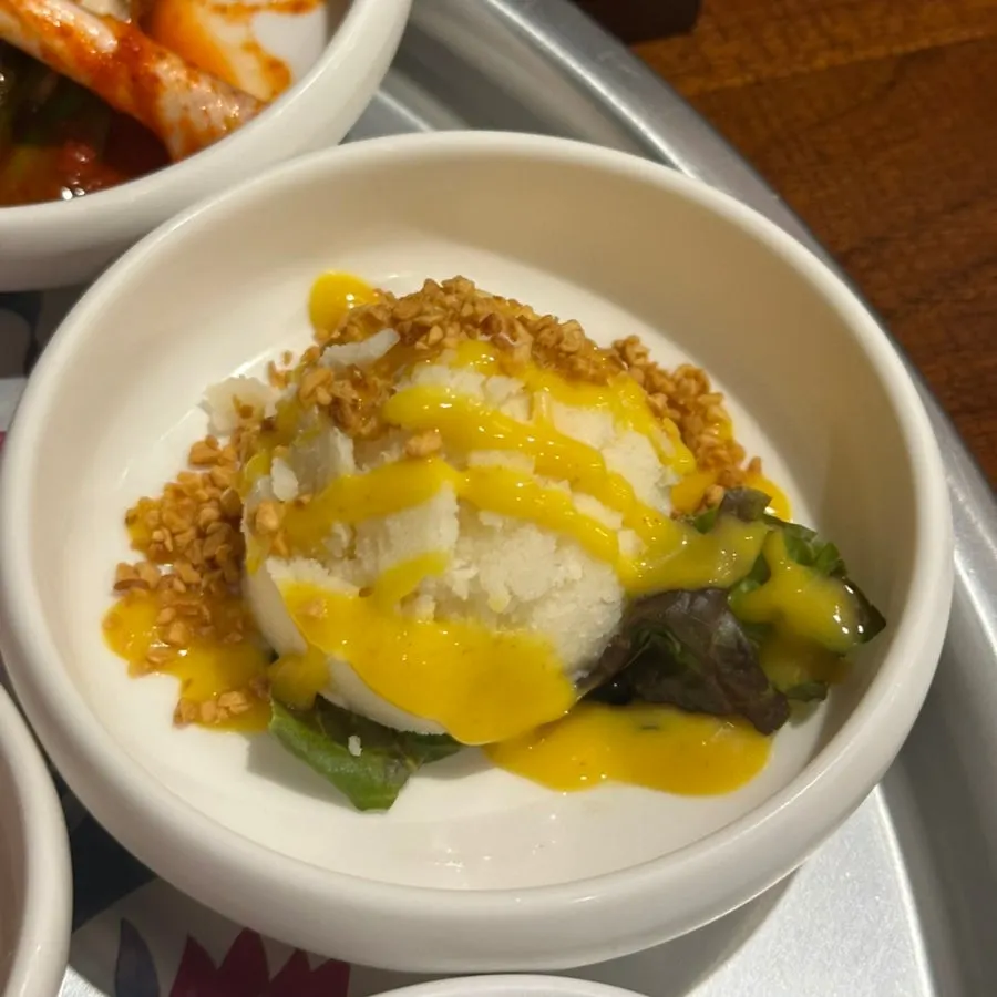 Salad topped with garlic flakes