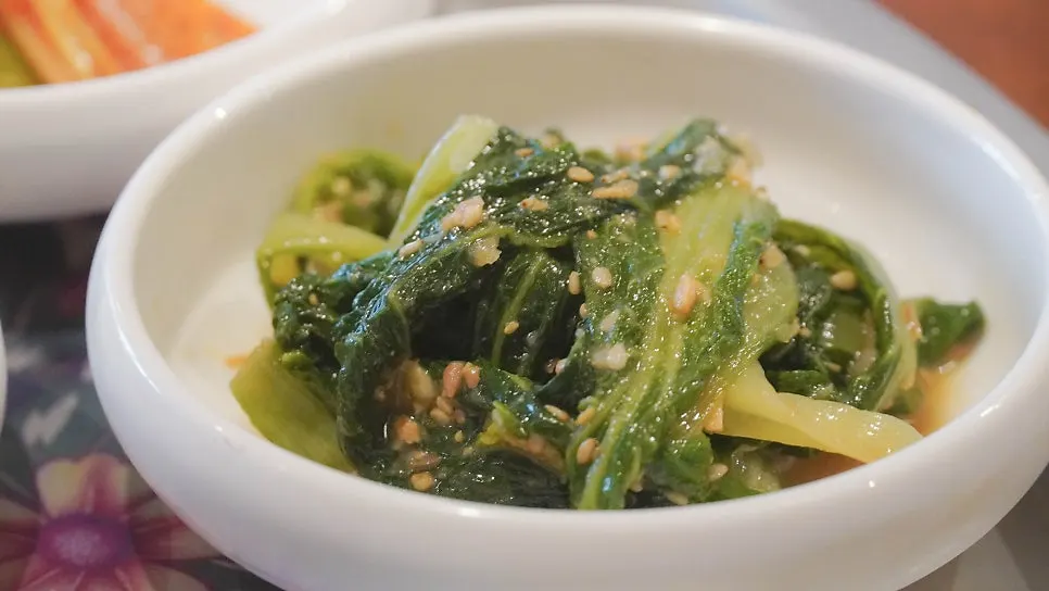 Side dishes that pair well with the meat at Jipbul Taebaek