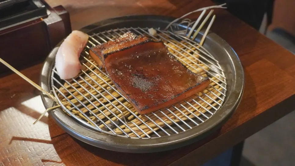 A generous portion of straw-fired pork jowl for two