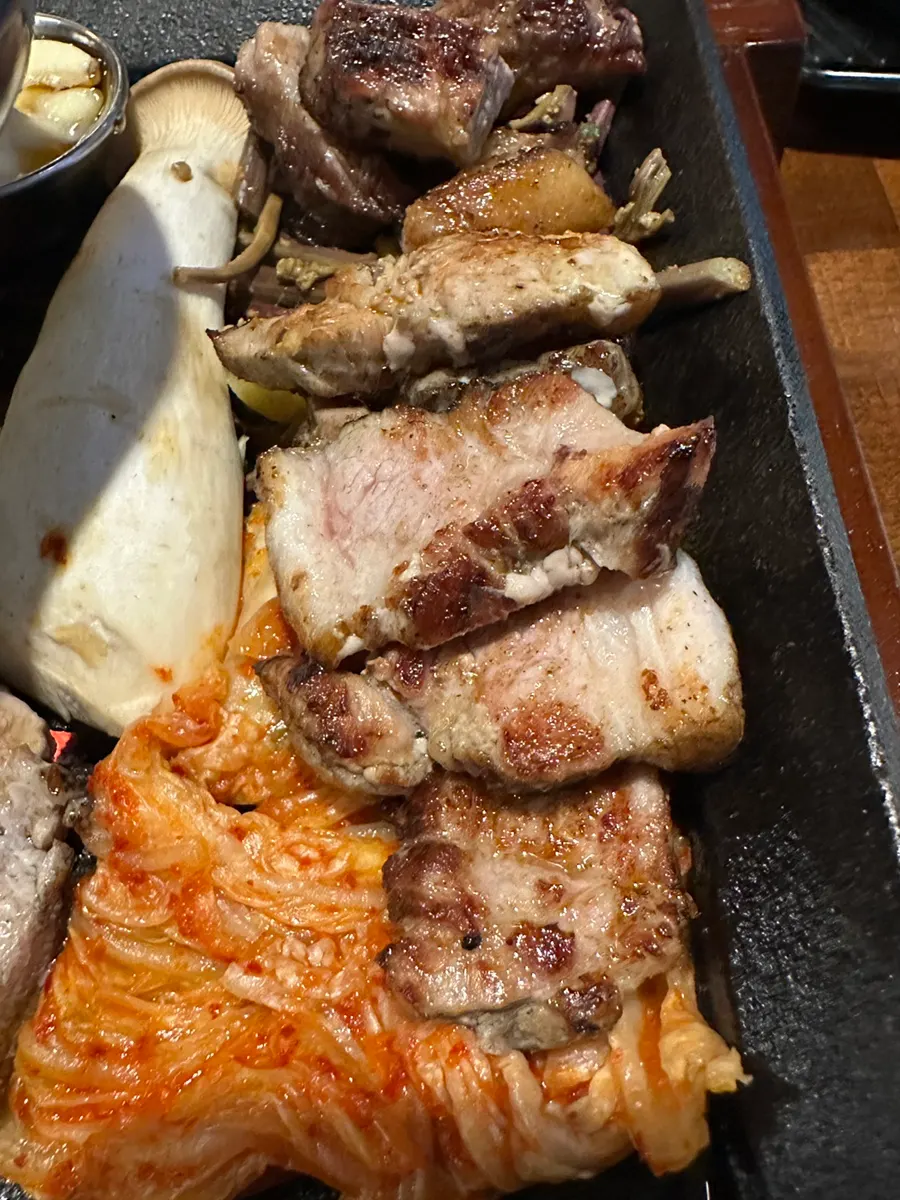 Pork belly grilling on the tabletop grill
