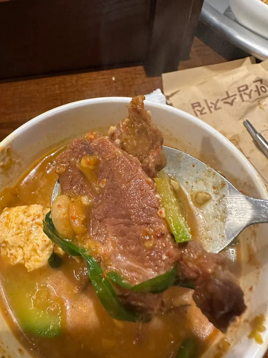 Soybean paste stew served with a bowl of rice