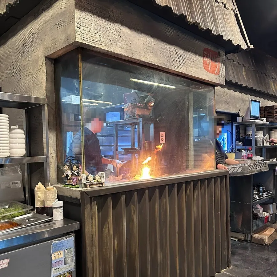 Interior of Jipbul Taebaek Suwon Ingye Branch with a Taebaek mining-town concept