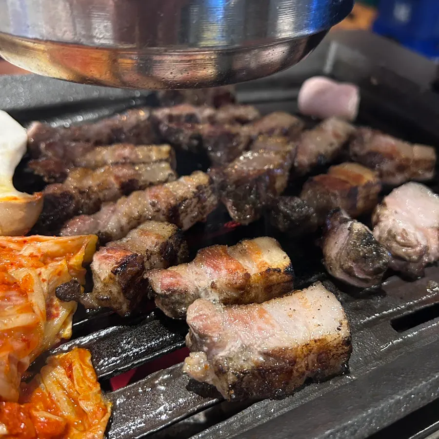 Cross-section of the 25mm-thick straw-fired whole pork belly
