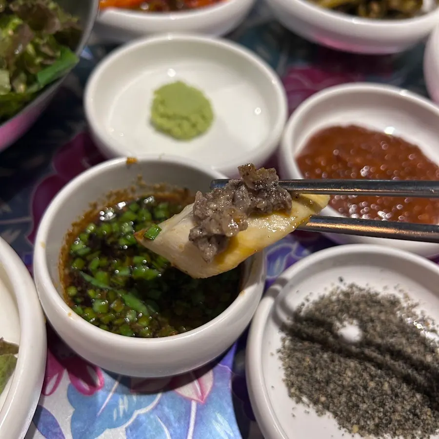Garnish king oyster mushroom topped with pesto