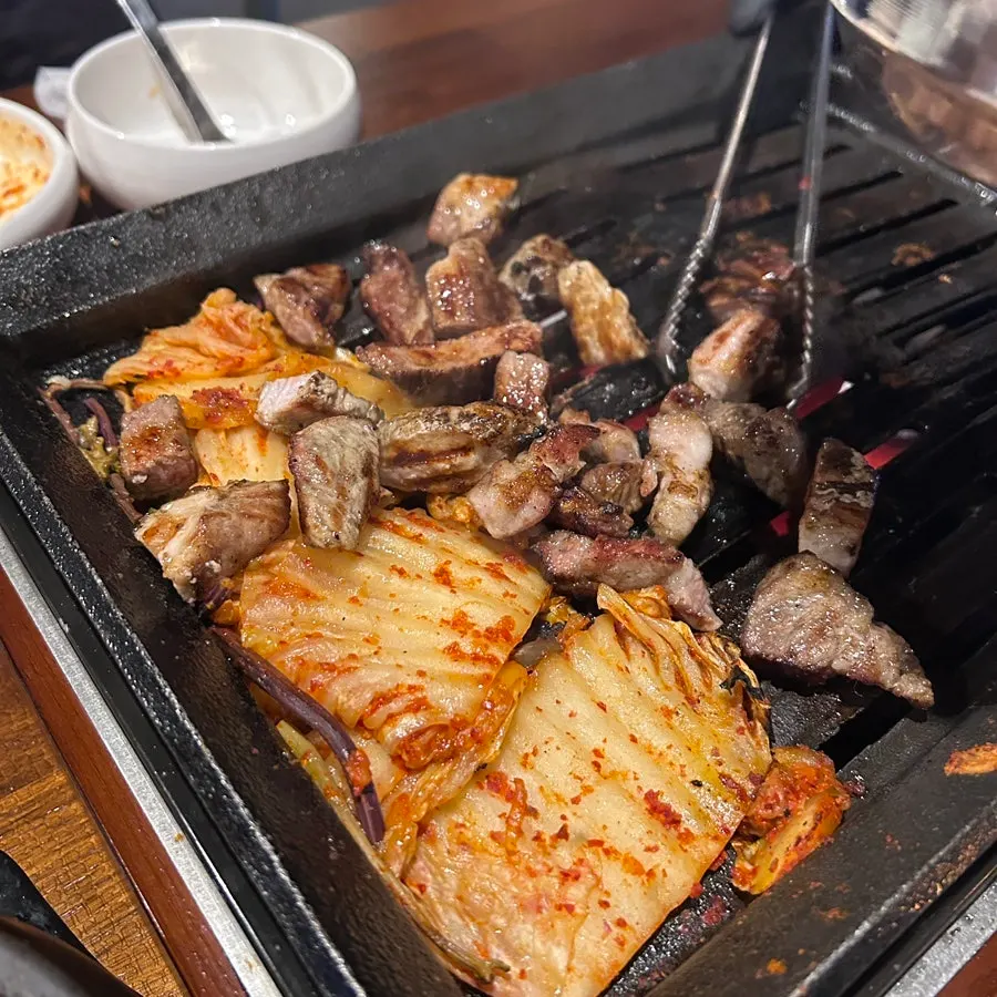 A large single serving of straw-fired pork neck