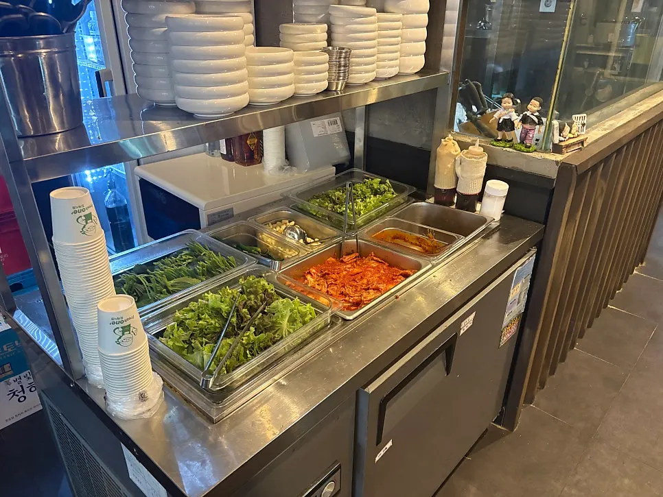 Side dish plates served alongside the meat