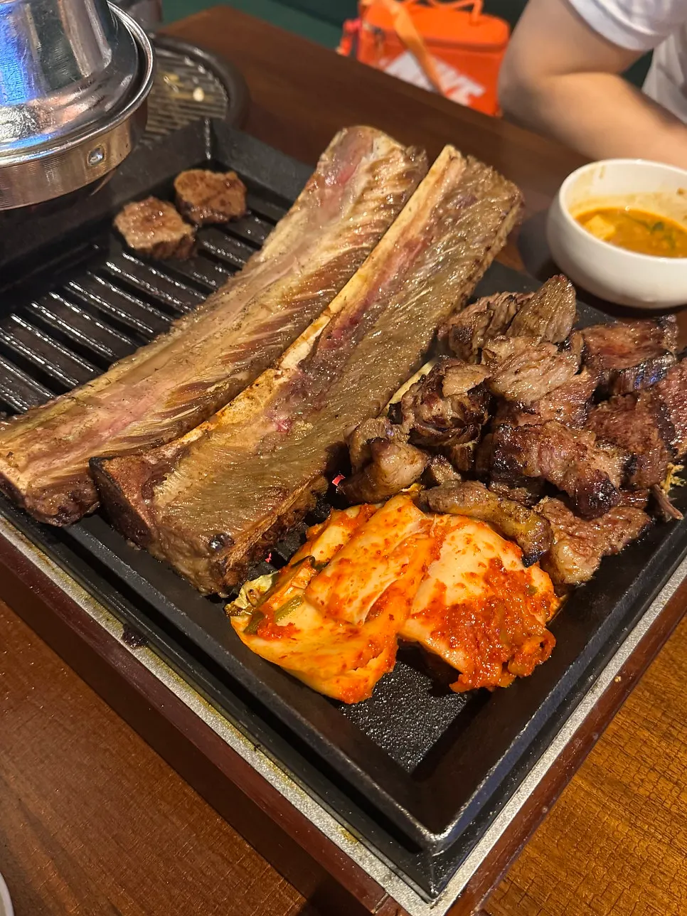 Grill with rib bones cooking