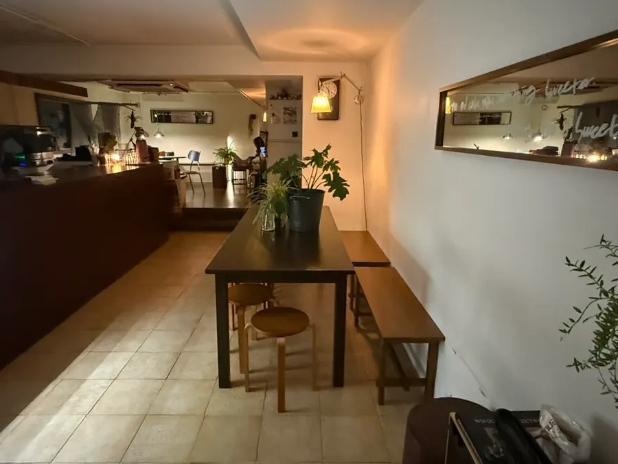 Interior of Jitheunsan with wood-toned furniture and soft lighting