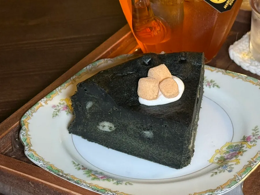 Mugwort injeolmi terrine cake topped with rice cake