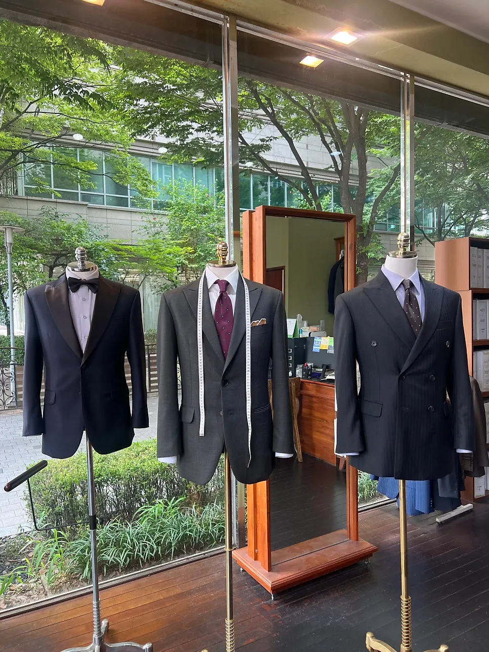 Interior of JJ Republic Seongnam with suits on display