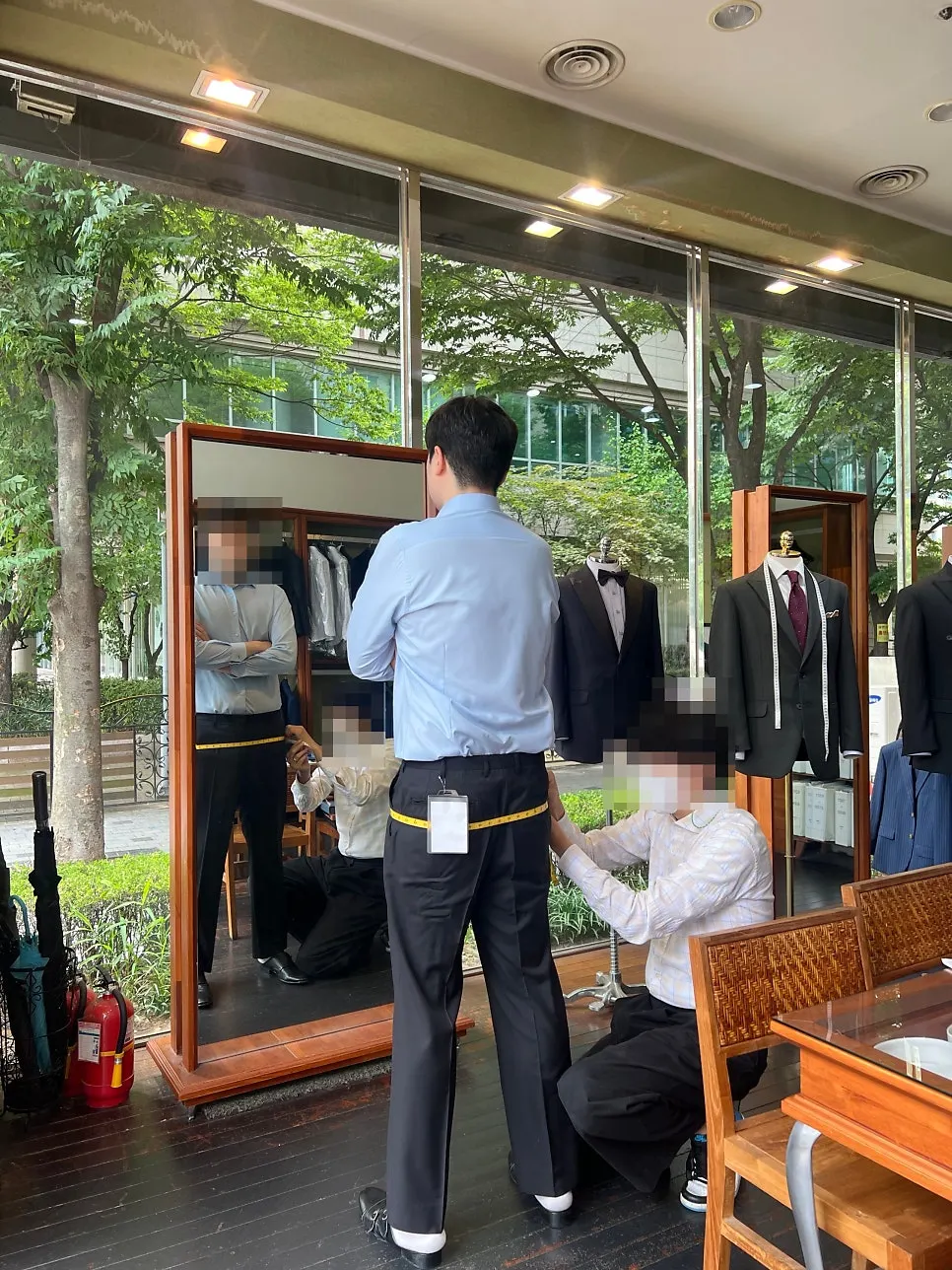 Measuring lower body size wearing a shirt and slacks