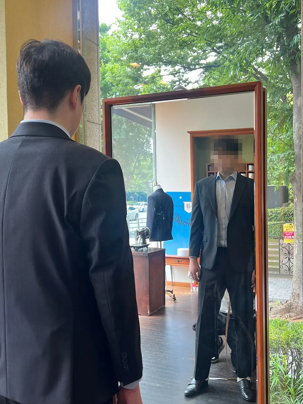 Checking the hem length of the trousers