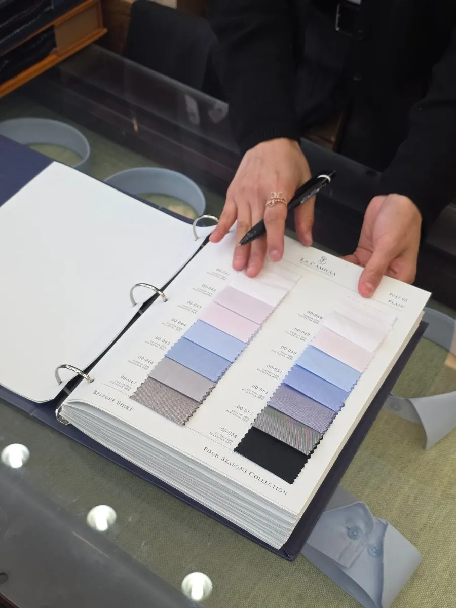 Discussing details for the father-of-the-groom suit