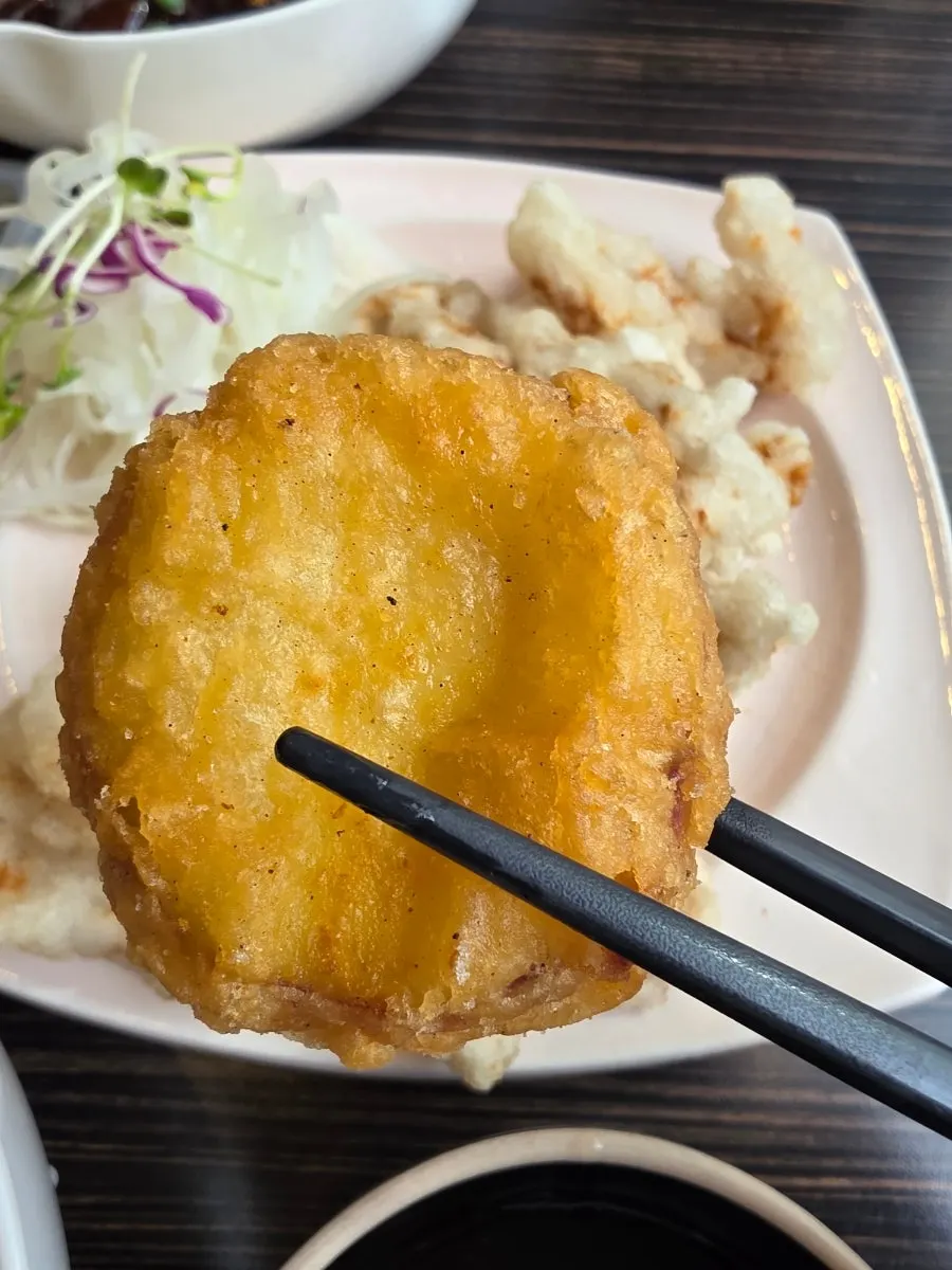 Cross-section of the sticky rice sweet and sour pork showing lean meat