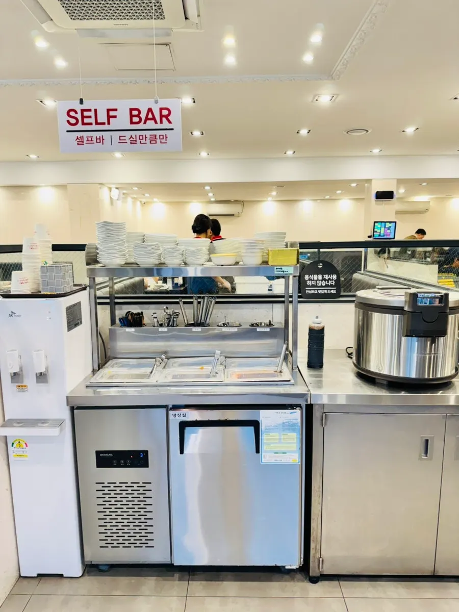 Self-serve bar with basic side dishes and toppings