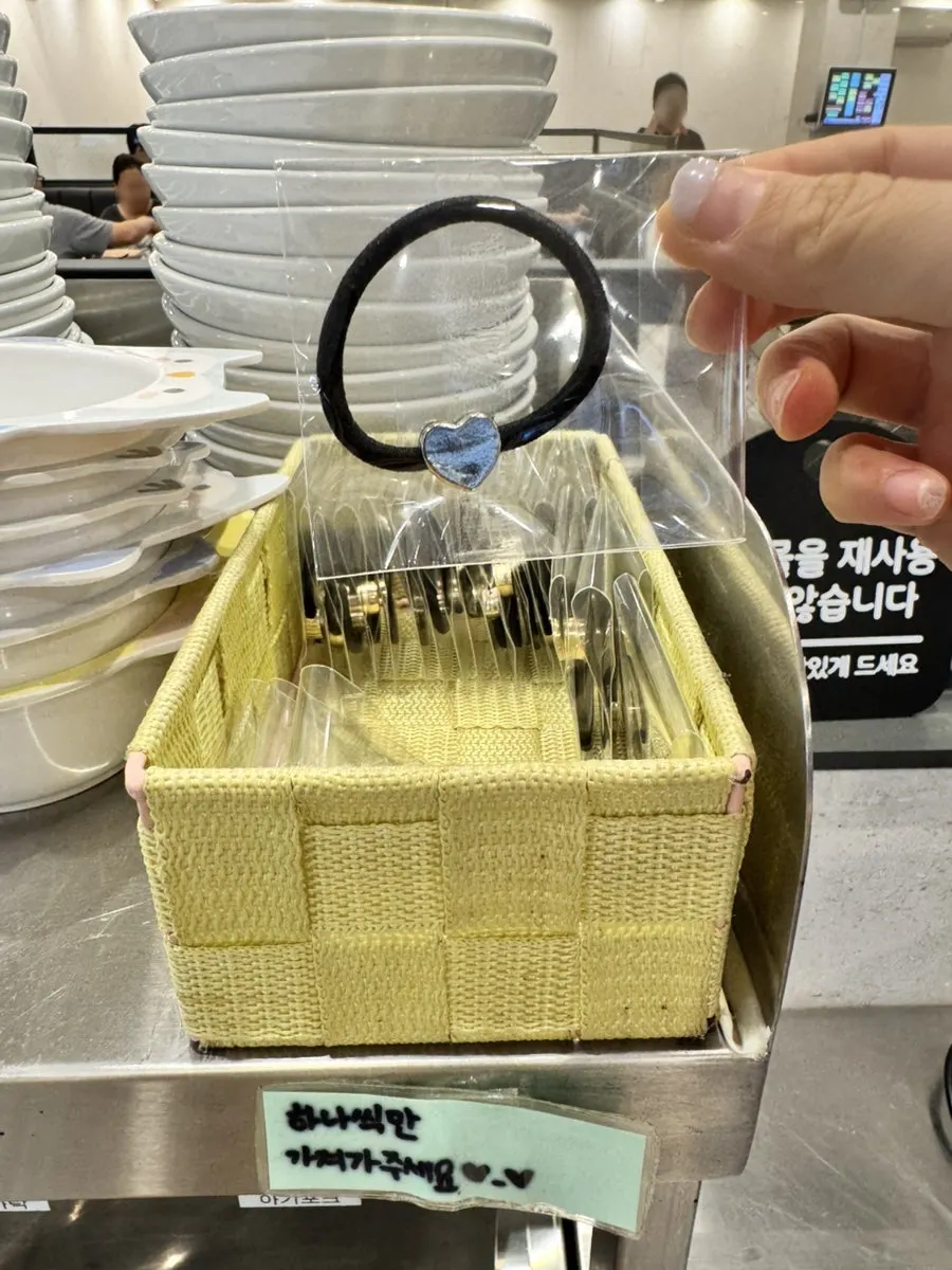 Individually wrapped hair ties at the self-serve bar