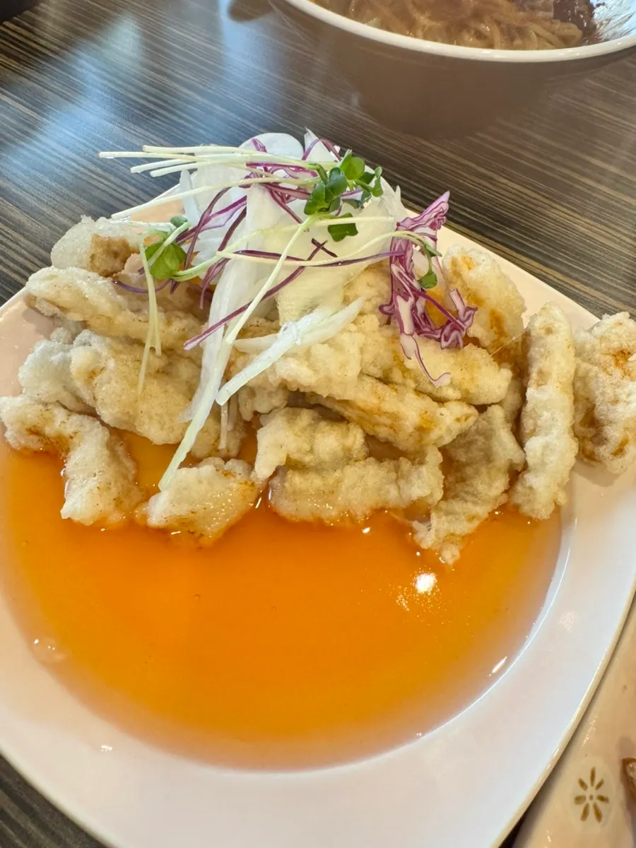 Sweet rice tangsuyuk served with sauce on the side