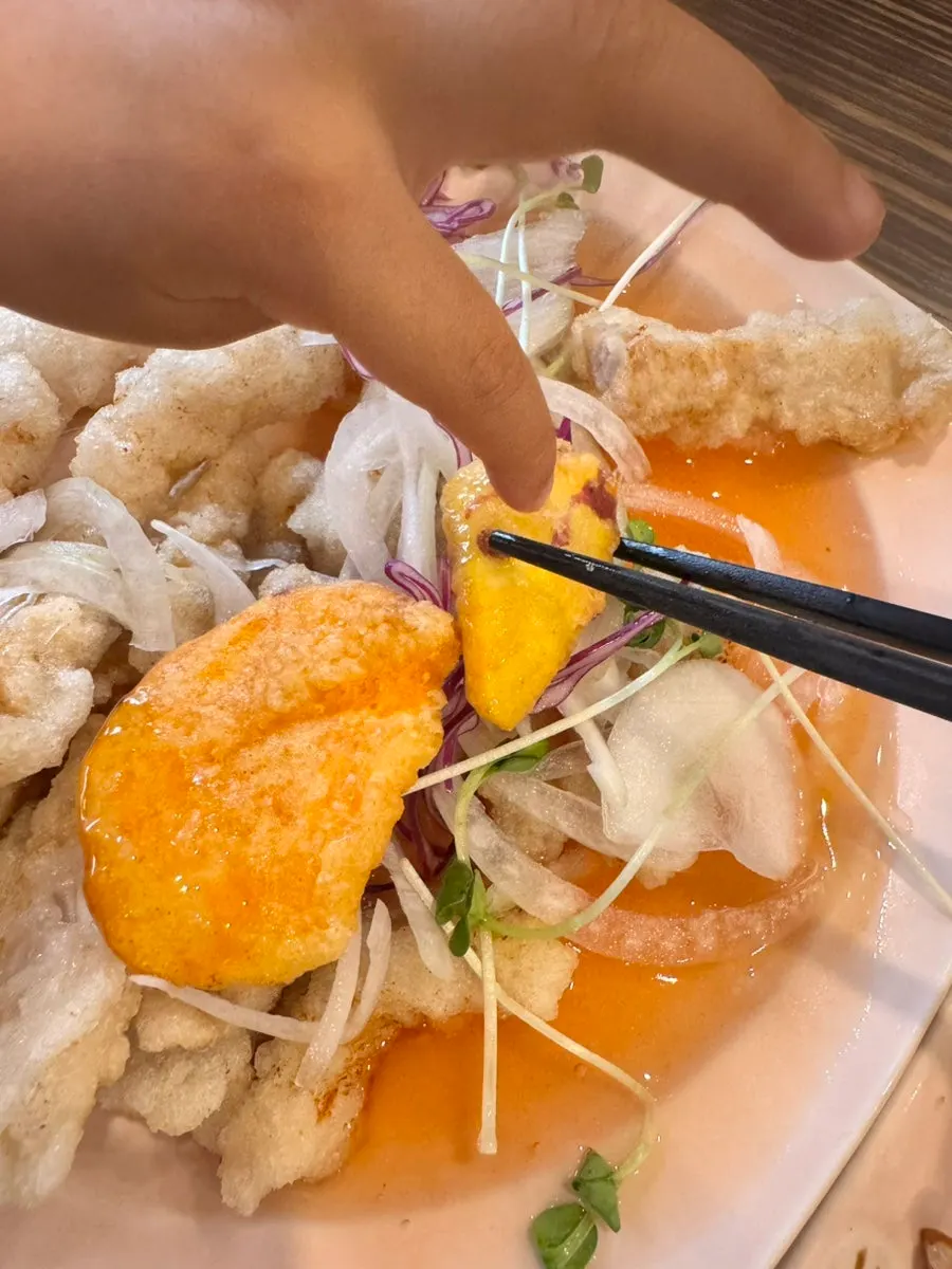Sweet rice tangsuyuk with sauce poured over it