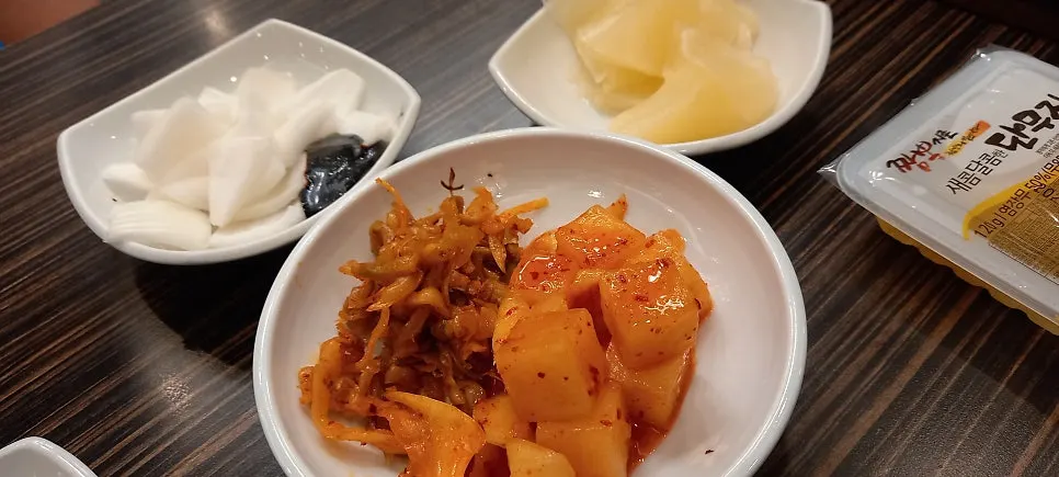 Self-serve bar stocked with jjacai and pickled radish