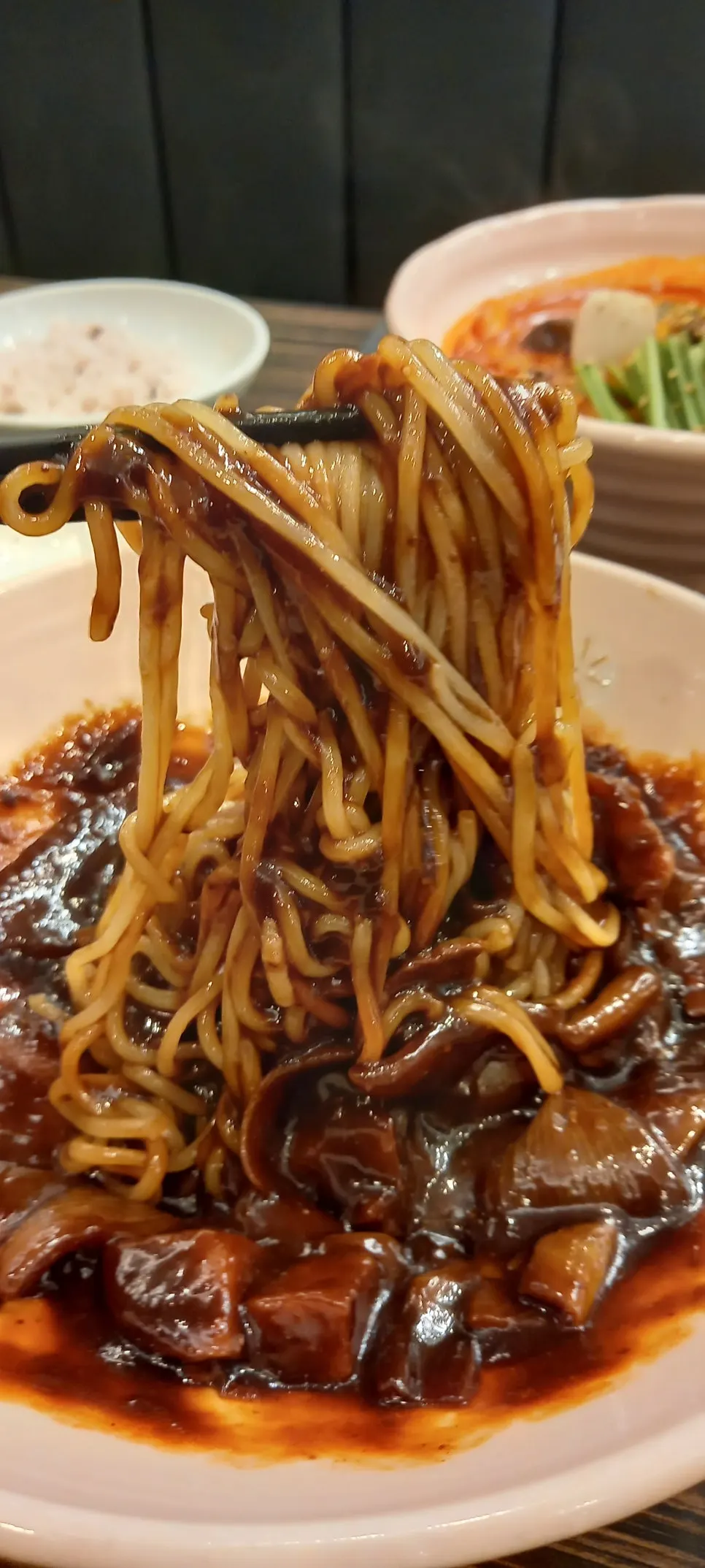 A bowl of jijon jjajang with black sauce