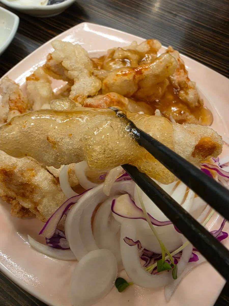 A plate of crispy fried sweet and sour pork