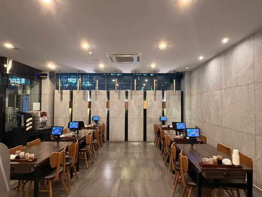 Spacious dining hall seating suitable for group gatherings